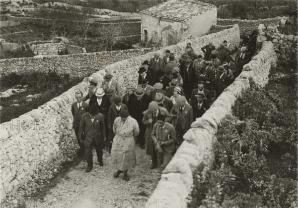 Members of the Touring Club Italiano  on the move. 
	
		1924