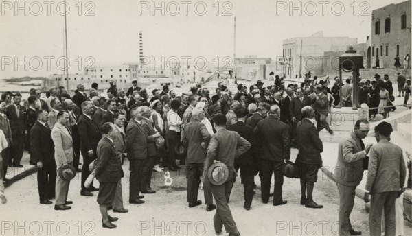 Excursionists at the monument to the Italian fallen in Libya. 
	
		1931