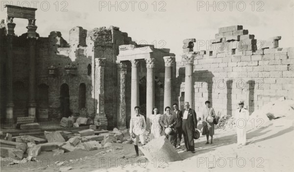 Excursionists in the Basilica of the Severi in Leptis Magna. 
	
		1931