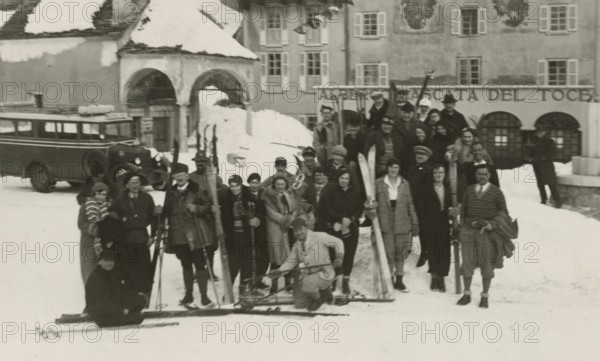 A group of skiers in front of the Cascata del Toce Hotel. 1931