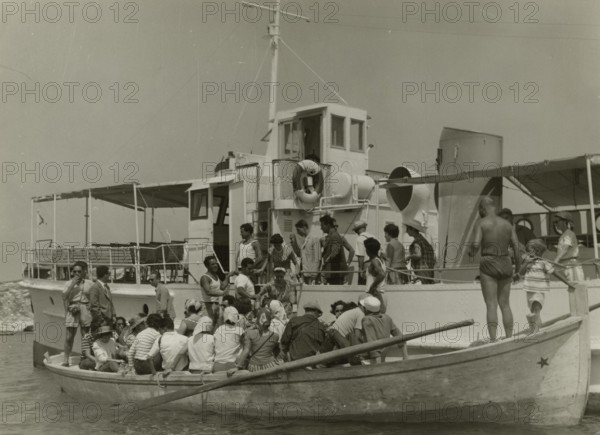 Touring Club  Members  traveling to the Tremiti Islands campsite. 1958