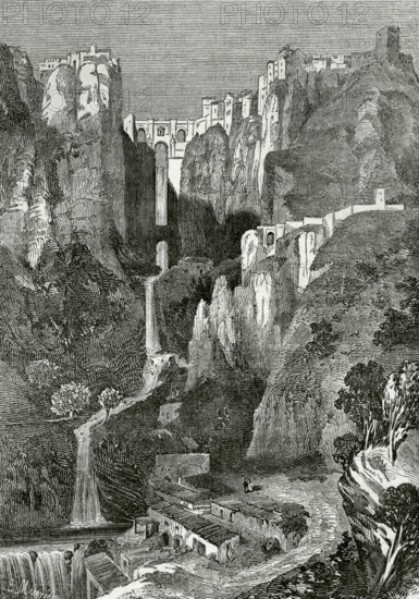 Ronda, province of Malaga, Andalusia, Spain. El Tajo de Ronda Gorge. Engraving by Arroyo. Cronica General de Espana, Historia Ilustrada y Descriptiva de sus Provincias (General Chronicle of Spain, Illustrated and Descriptive History of its Provinces), Andalucia, 1869.