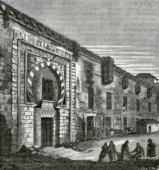 Malaga, Andalusia, Spain. View of the Atarazanas, a former Nasrid shipyard (14th century) which was used for different military functions over the years. It was demolished in 1870 to convert it into a market, although the Arabic marble door was preserved. Drawing by Letre. Engraving by Sierra. Cronica General de Espana, Historia Ilustrada y Descriptiva de sus Provincias (General Chronicle of Spain, Illustrated and Descriptive History of its Provinces), Andalucia, 1869.