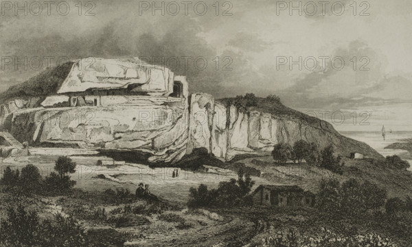 Xaghra, Island of Gozo, Malta. Calypso's Cave. Natural cave in Ramla Bay. It is believed that the island of Gozo would be the same as Ogygia, called Calypso's island in Homer's ""Odyssey"". The nymph Calypso held Odysseus prisoner for seven years on this island. Engraving. Lemaitre direxit. History of Malta and Gozo, by Frederic Lacroix. Panorama Universal, Spanish edition, printed in Barcelona, 1850.
