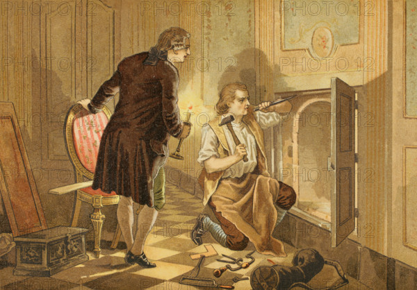 Louis XVI (1754-1793). King of France (1774-1792). Louis XVI illuminating the locksmith Francois Gamain during the making of the ""armoire de fer"" (iron chest). Secret documents were kept in this space hidden behind a wooden panel at the king's apartments in the Tuileries Palace. Chromolithography. ""Los Girondinos"" (Revolucion Francesa) (The Girondins, French Revolution), by A. de Lamartine. Volume I. Published in Barcelona, 1904.
