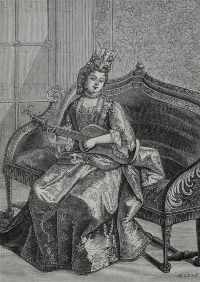 Charlotte Felicitas of Brunswick-Lüneburg (1671-1710). German princess member of the House of Hanover. After marrying Rinaldo d'Este, she became Duchess of Modena. Charlotte playing the guitar. Engraving by Huyot after Jean Mariette (1660-1742). XVIIme siècle: lettres, sciences et arts, France 1590-1700 (17th century: letters, sciences and arts), by Paul Lacroix. Published in Paris by Librairie de Firmin-Didot et Cie, 1882.