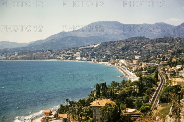 View from Ponte de Luigi, of Mediterranean Sea coastline, French Riviera, Menton, France 1959.