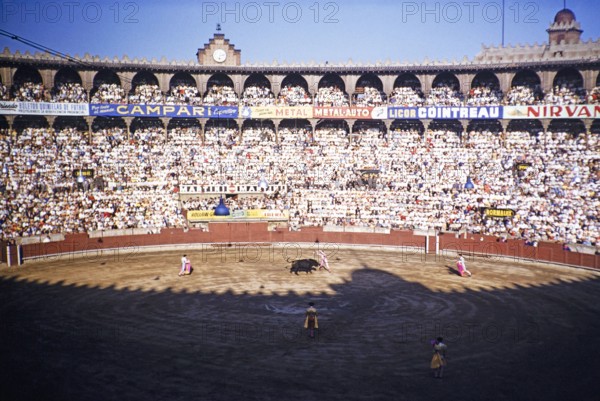 Inside Plaza de Toros Monumental de Barcelona bullring, bullfighting in progress, Barcelona, Catalonia, Spain July 1958.