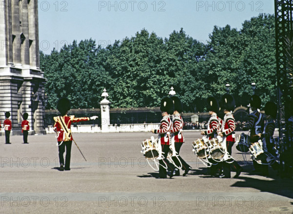 Guardsmen soliders marching, Changing of the Guard, Buckingham Palace, London, England, Uk, late 1950s, early 1960s.