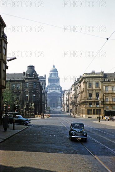 View to Palace of Justice, Rue de la Regence, Brussels, Belgium, Europe late 1950s - Fiat Topolino model C car.