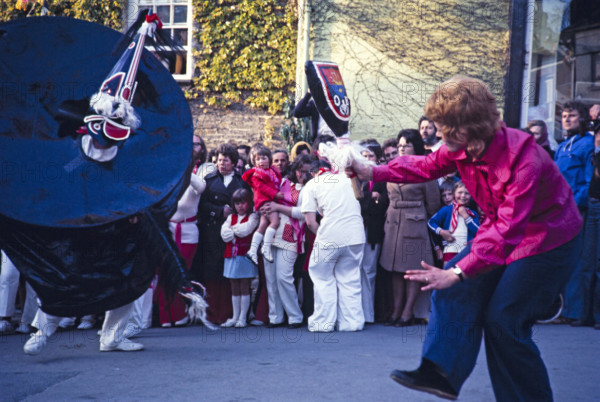 Obby Horse May Day festival, Padstow, Cornwall, England, UK 1975 - The Old 'Oss and Teaser.