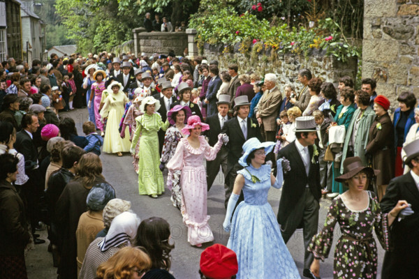 Flora Day, Helston, Cornwall, England, UK 1973 - crowds watch couples perform the  Furry dance in the streets of the town.