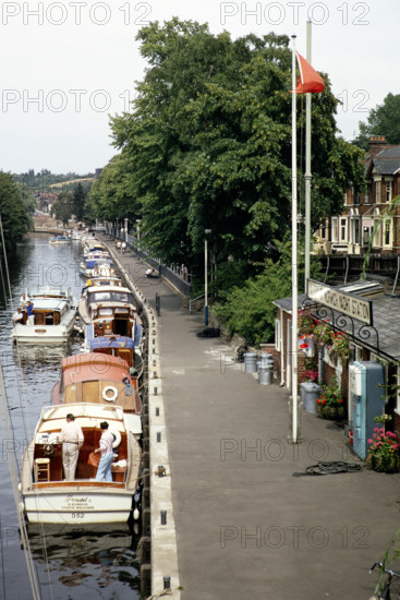 Boats on River Wensum, Norwich Yacht station,  Norwich, Norfolk, England, UK July 1970.