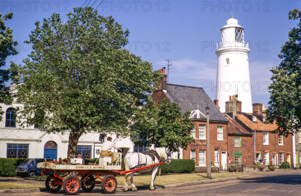 Adams brewery dray and lighthouse in town centre, Southwold, Suffolk, England, UK July 1971.