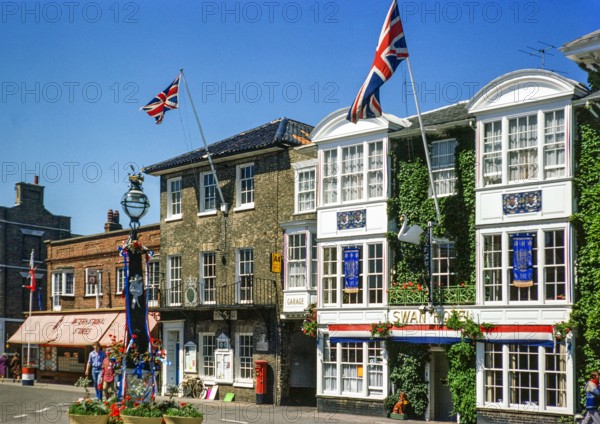Flags and bunting decorating the street for Queen Elizabeth  Silver Jubilee celebrations 1977, Southwold, Suffolk, England, UK.