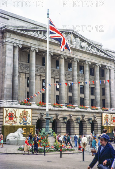 Flags and bunting decorating Council House building for Queen Elizabeth Silver Jubilee celebrations Nottingham, Nottinghamshire, England, UK 1977.