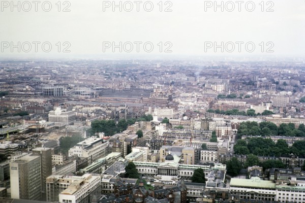 View north east from Post Office tower over University of London towards St Pancras railway station, central London, England, UK 1967.