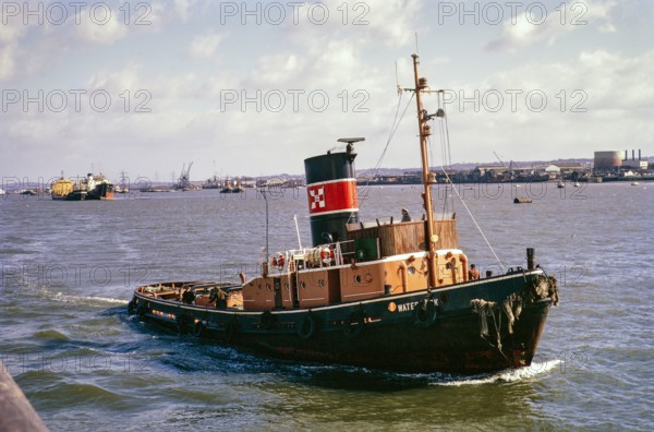 Tugboat 'Watercock, River Thames, London, England, UK 1971.