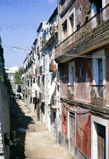 Historic building housing apartments in terrace Ibiza town,  Ibiza, Balearic Islands, Spain 1967.