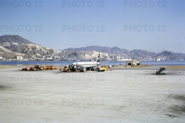 BOAC British Overseas Airways Corporation, De Havilland 106 Comet 4 jetliner plane, G-APDC,  at Kai Tai airport, Hong Kong, Asia early 1960s.