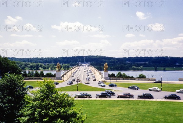 Cars driving over Arlington Memorial Bridge, Washington DC, USA c 1953.