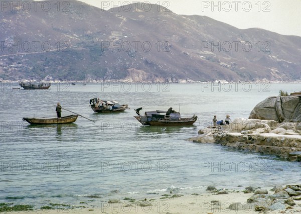 People living on sampan boats probably at Tide Cove, New Territories, Hong Kong, Asia, 1964.