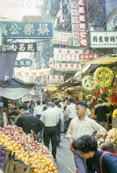 Captioned as 'Chinese fruit and flower stalls', Victoria, Hong Kong, Asia 1964.