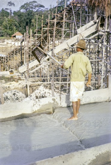 Open Cast gravel-pumping tin mine Malaya, Malaysia, south east Asia 1964 - Ore separation in the Palong where heavier tin ore accumulates.