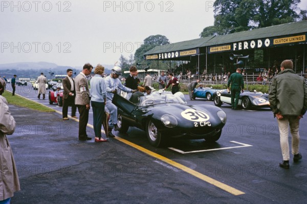 Whitsun Sports car race 3 June 1963, John Coundley in Jaguar D-type car on start line, Goodwood, England, UK.