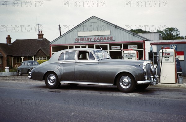 Bentley S1 Saloon car at petrol pumps of Riseley Garage, Berkshire, England, UK May 1961.