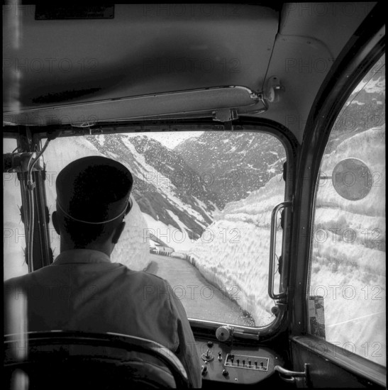 Post bus crossing the Grimsel pass, 1955