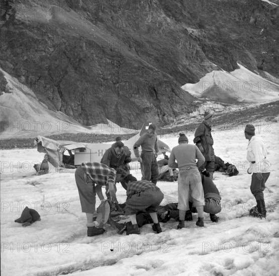 Crash of a REGA plane, wreckage upon a glacier 1957