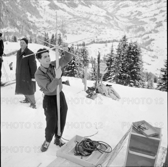 Longines technicians install the apparatus for time recording with Chronocamera, 1950
