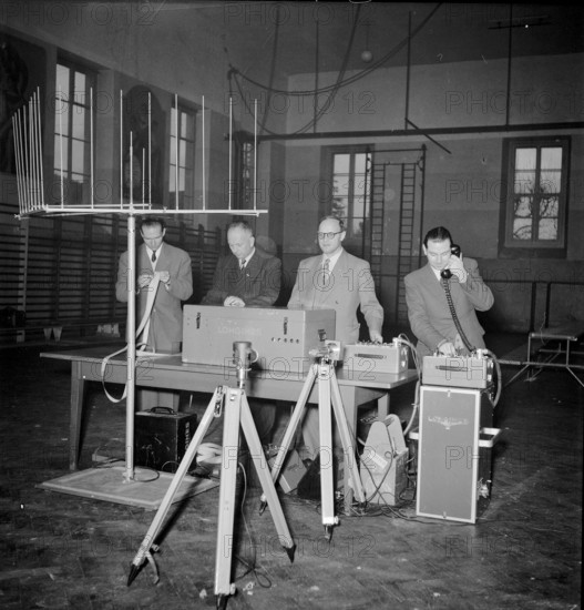 Longines technicians test the apparatus for time recording with Chronocamera, 1950