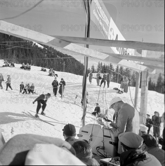 Longines technicians install the apparatus for time recording with Chronocamera, 1950
