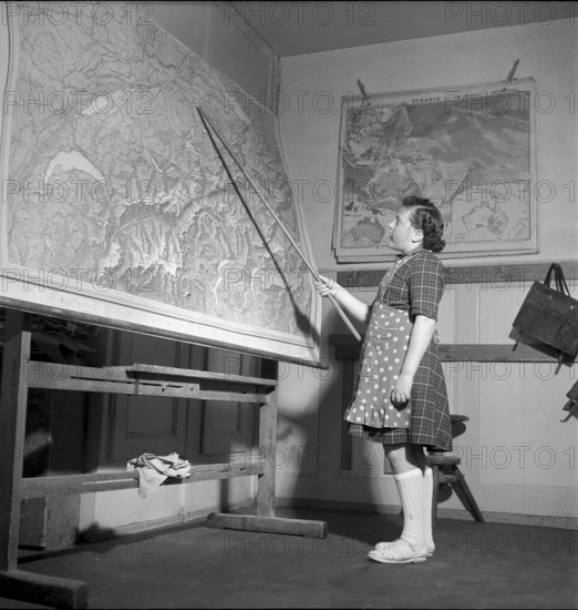 Schoolgirl during geography lesson, La Brevine, 1951