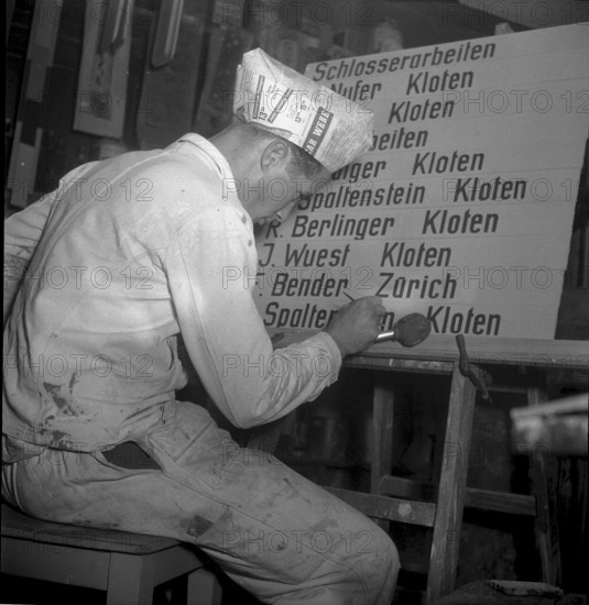 Compositor designs a board,  layout, Kloten 1948