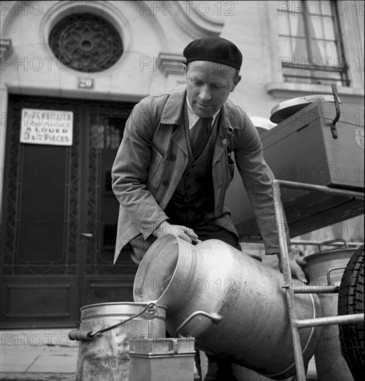 Milkman delivering milk in Geneva 1943