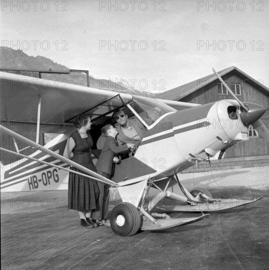 Christmas Eve 1957: Hermann Geiger, glacier pilot with family