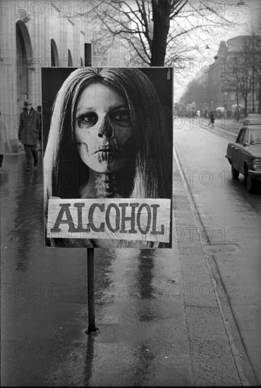 Poster warning of drug abuse has been taped over with the word alcohol, 1969
