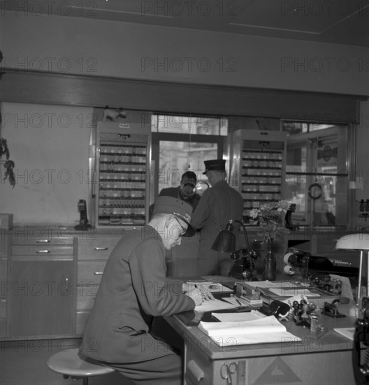Christmas Eve 1953: counter clerk