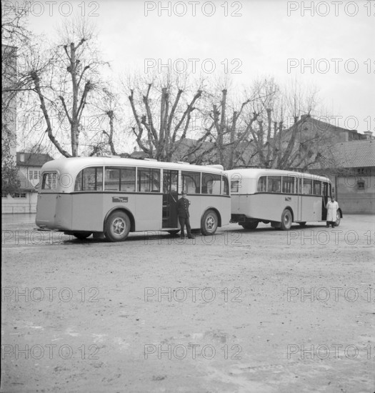 Post bus with trailer doing public transports from Aarau to Frick 1950