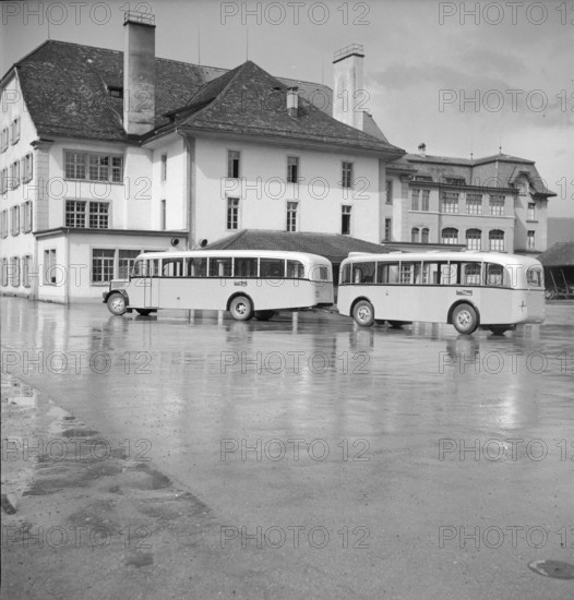 Post bus with trailer doing public transports from Aarau to Frick 1950