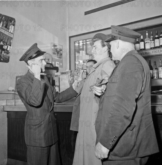 Drivers of the Welti-Furrer taxi escorting drunk at home, Zurich 1951