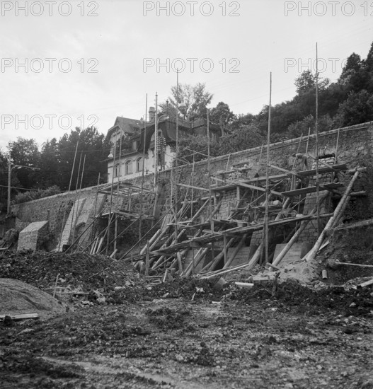The road between Neuchatel and Bienne under renovation after subside, 1951