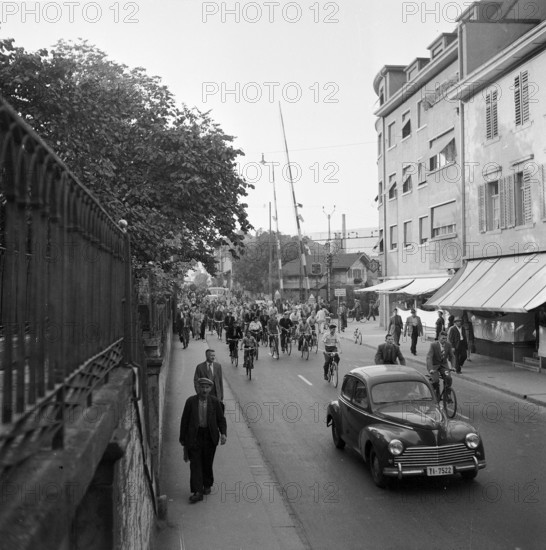 BBC closing time, cyclists and pedestrian in Baden, 1951