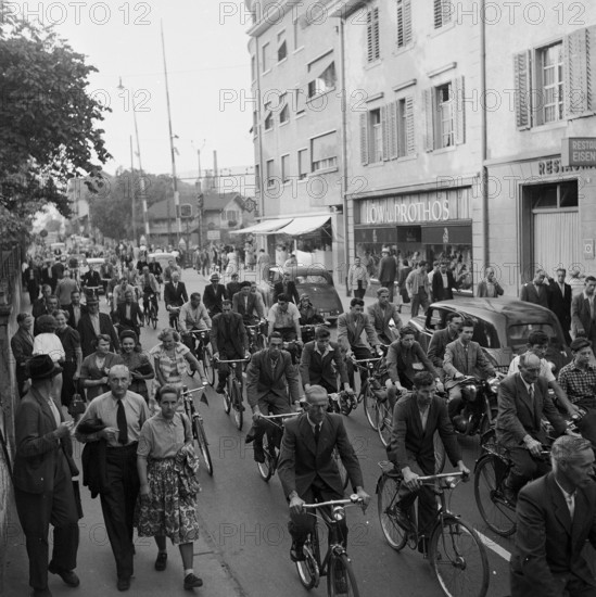 BBC closing time, cyclists and pedestrian in Baden, 1951