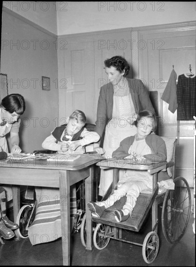 Student with handicapped children at school for social work, Zurich 1953