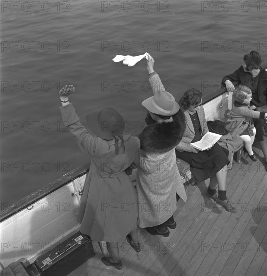 Lake Lucerne, women waving aboard 1940