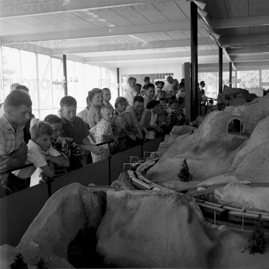 Boys watching a model railway, Lucerne Traffic Museum opening 1959